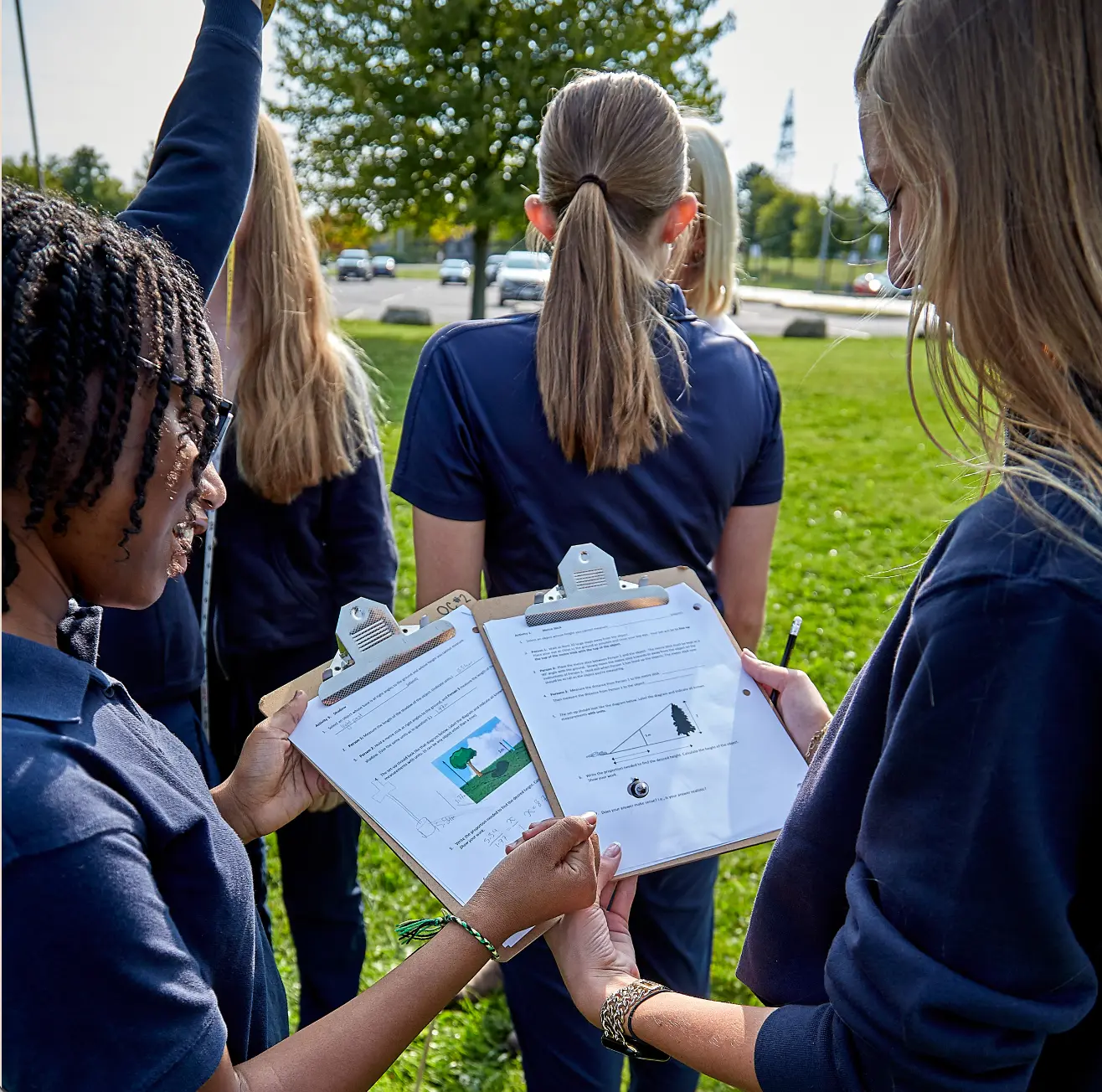 Girls Learning Math Outside
