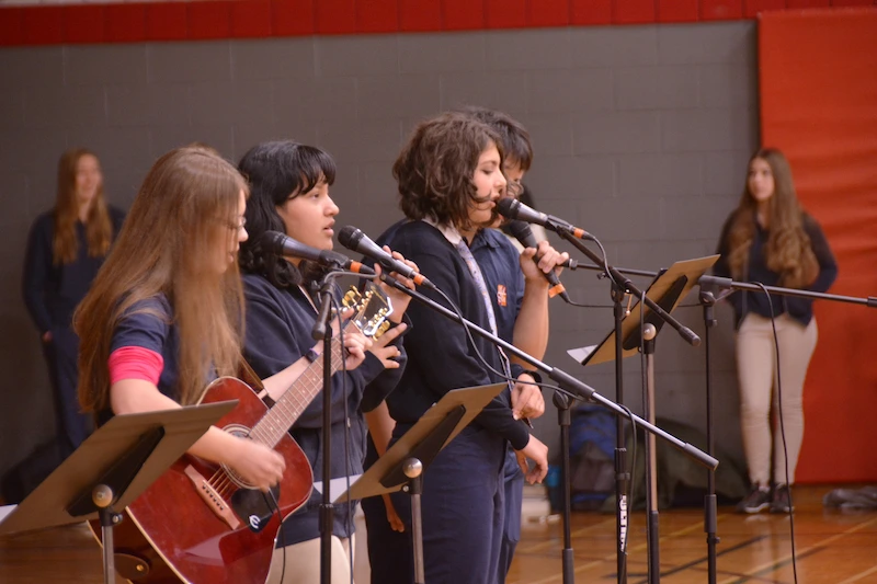Students singing at assembly